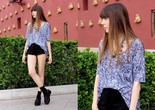 gray oversized t-shirt with high waist and black denim shorts