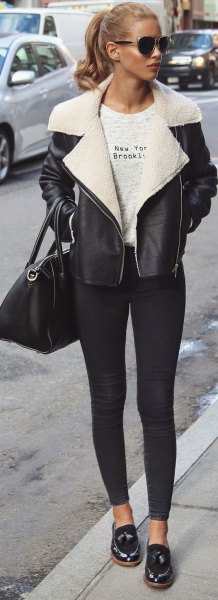 black leather jacket with white collar and skinny jeans