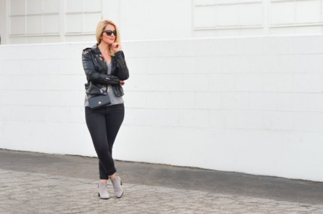 black leather jacket with scoop neck t-shirt and gray ankle boots