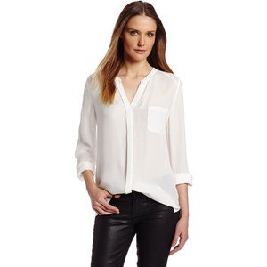 White collarless chiffon V-neck shirt, black leather trousers