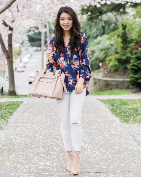Dark blue floral shirt and white jeans