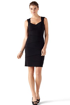black sleeveless mini dress with V-neckline and open toe heels