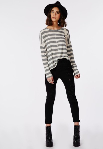 gray and white striped long-sleeved T-shirt with a black felt hat