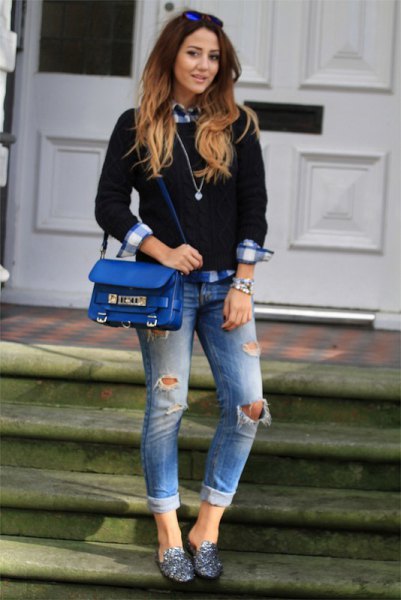 black knit sweater with plaid boyfriend shirt and ripped jeans