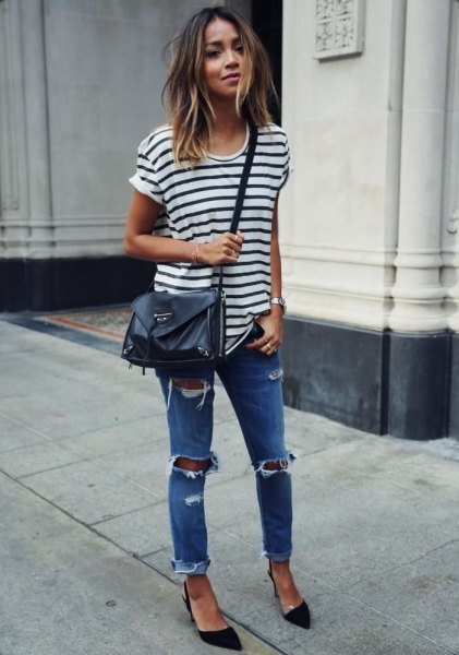 white and black striped t-shirt with skinny jeans and leather shoulder bag