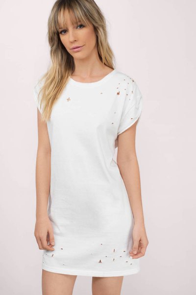 white distressed t-shirt dress with sneakers