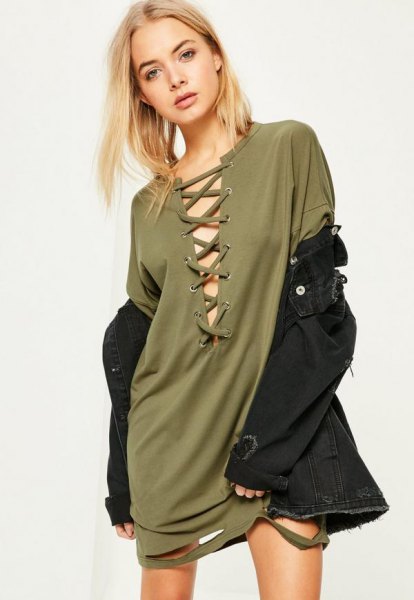 green lace t-shirt dress in front with black denim jacket