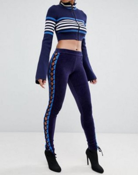 Dark blue running leggings with matching cropped zip-up sweater
