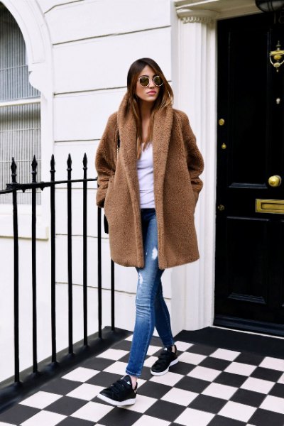 brown teddy coat ripped jeans sneakers