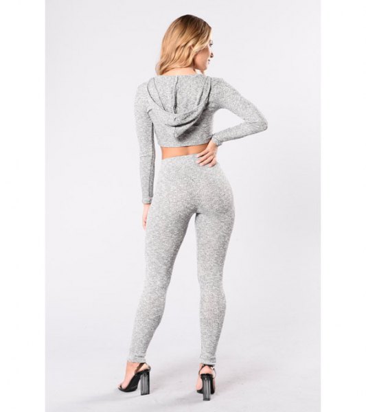 gray cropped hoodie with matching leggings and high waisted heels
