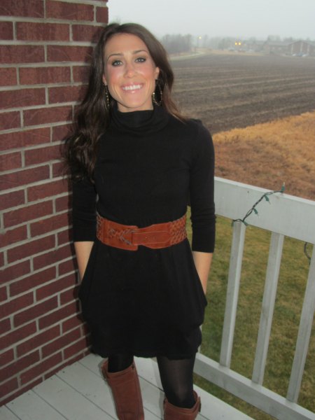 black mini sweater dress with half sleeves and brown wide belt