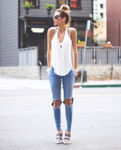 white tank top with light blue skinny jeans and plaid sneakers