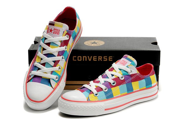 yellow blue red and white low top canvas sneakers