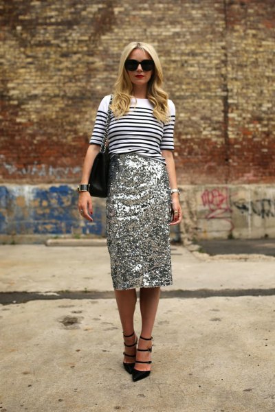 white and black striped knit sweater with gold midi sequin skirt