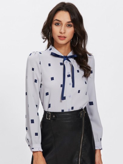 Light blue and dark blue printed leather skirt with tie blouse