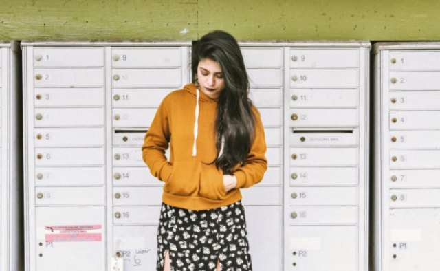 Mustard hoodie with black and white floral midi slit skirt