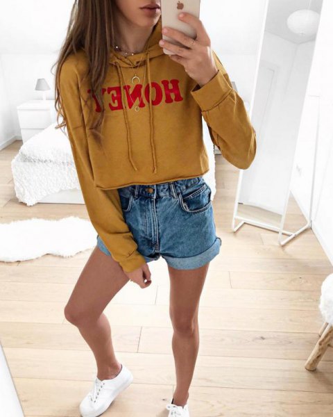 Short hoodie with mustard yellow print and blue denim mini shorts