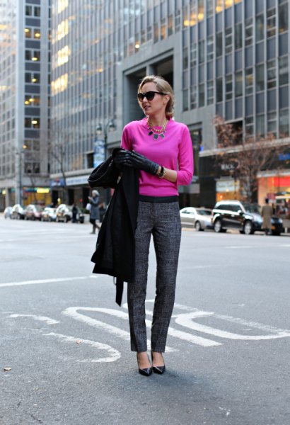 Neon pink sweater and gray tweed pants