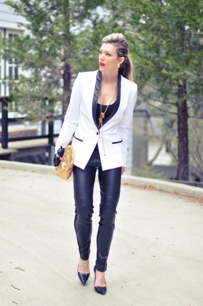 white and black blazer with skinny leather pants