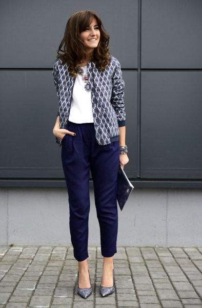 black and white printed blazer with white blouse and cropped navy pants