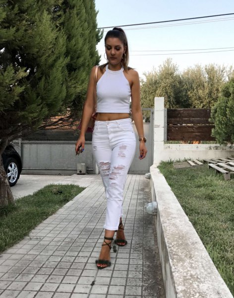white cropped skinny jeans with a halter top