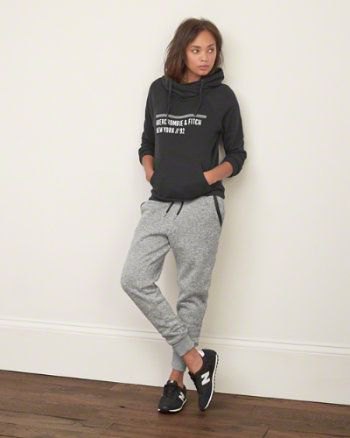 gray printed hoodie with sweatpants and black sweaters