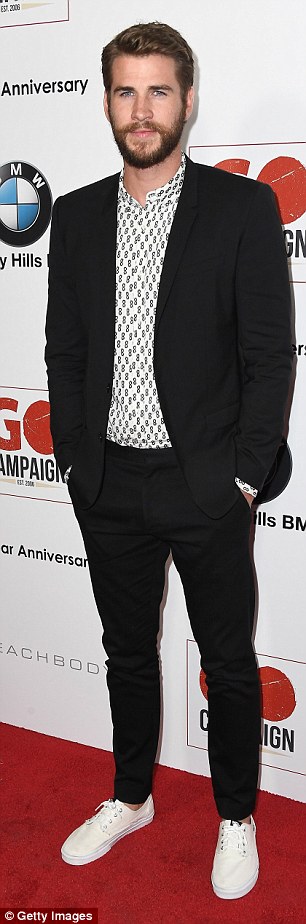 Liam Hemsworth hits the red carpet as he takes part in the GO campaign.