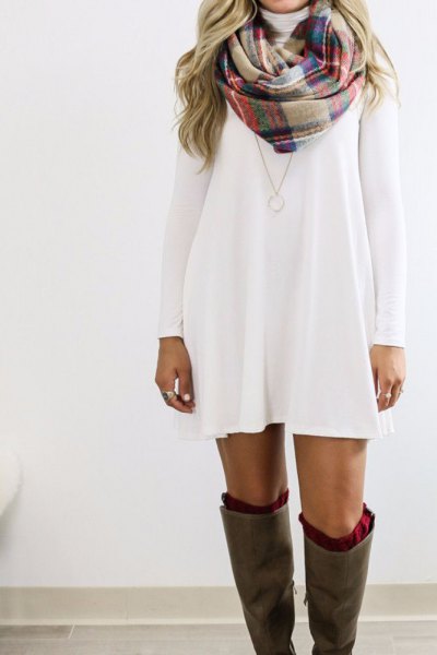white long sleeve swing dress with plaid crepe and dark blue scarf