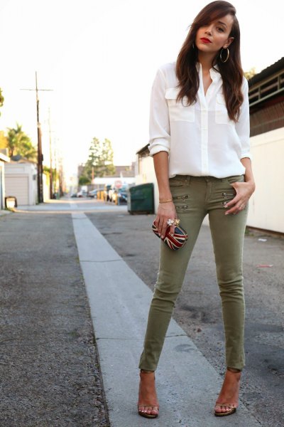 white button down chiffon blouse and olive drainpipe trousers