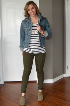 blue denim jacket with striped t-shirt and olive drainpipe pants