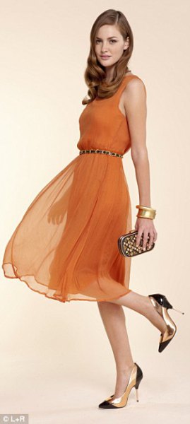 Orange strap dress with a chiffon belt and pointed toe heels