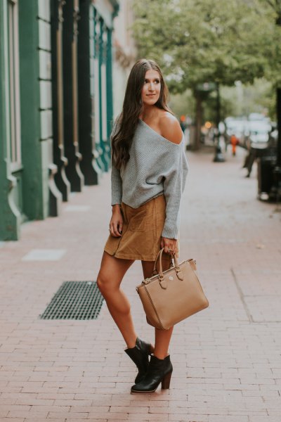 gray strapless sweater with tan mini skirt