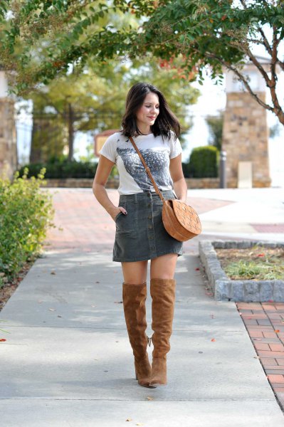 white printed t-shirt with a gray corduroy miniskirt and overknee boots