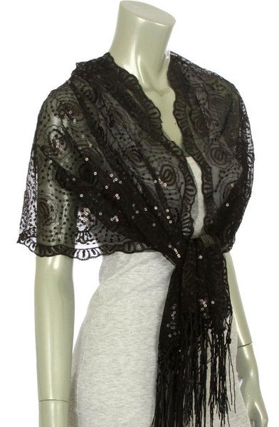 black lace scarf over a light gray bodycon mini dress