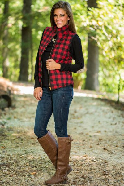 red and black checkered waistcoat with stand-up collar and brown knee-high leather boots