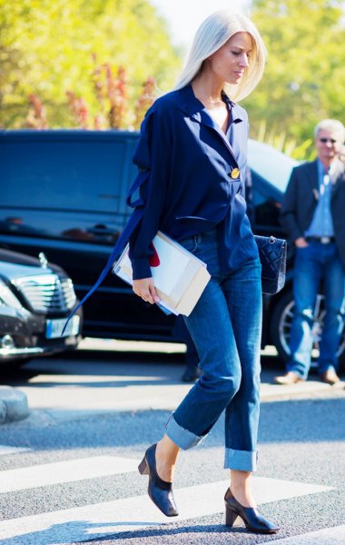 Chiffon blouse with cuffed jeans and dark blue platform heels