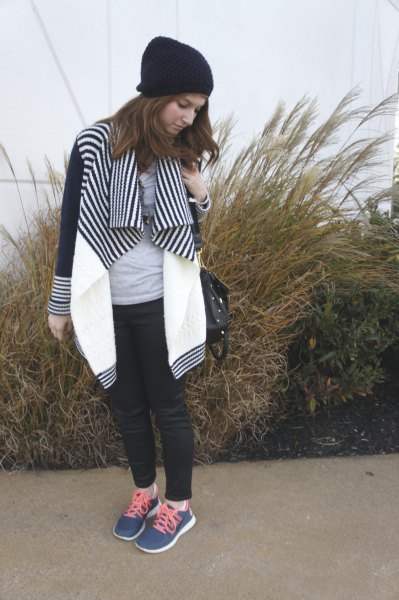 black and white striped color block jacket with navy blue sneakers
