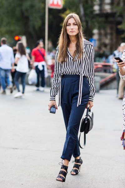 black and white striped long-sleeved shirt with dark blue chinos