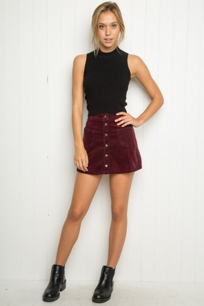 Black halter top with suede button mini skirt