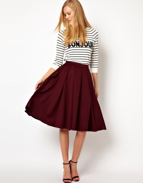 black and white striped three-quarter top with burgundy skater midi skirt