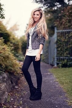black boots with a heather gray blazer and a long white t-shirt