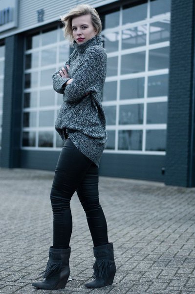gray turtleneck with leather leggings and black boots