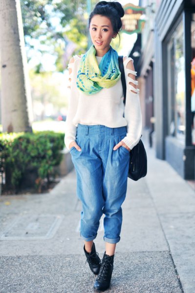 white sweater with silk scarf and cropped light blue pleated jeans