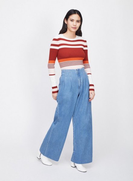red and white color block sweater with light blue wide leg jeans