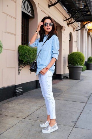 Light blue button down chambray shirt, cuffed slim fit jeans and metallic sneakers