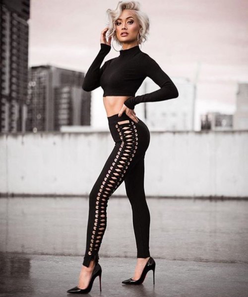 black cropped pullover with lacing and slim pants with lacing