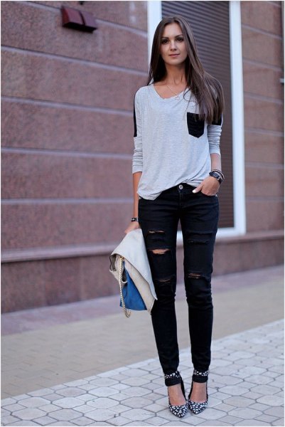 white and black t-shirt with front pocket, ripped jeans and ankle strap heels