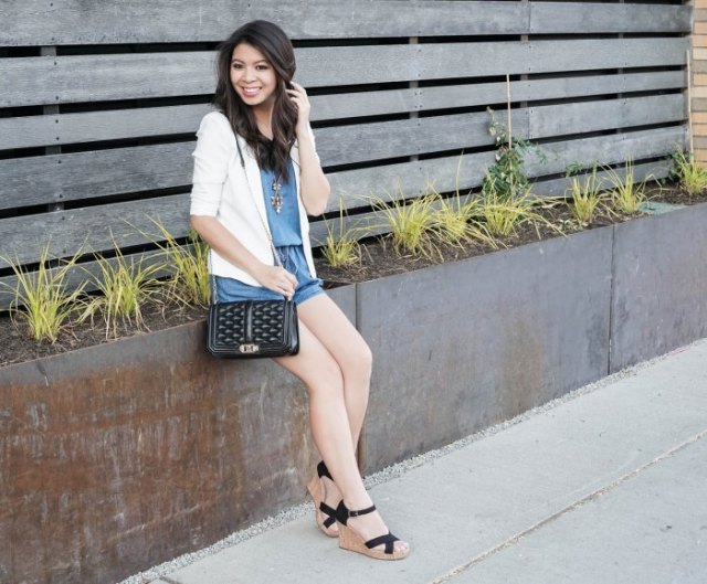 white blazer with blue mini shorts and black lace-up sandals