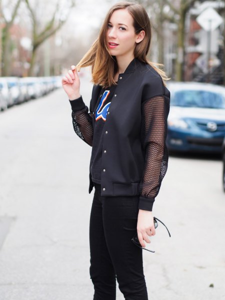 black mesh jacket with printed t-shirt and skinny jeans