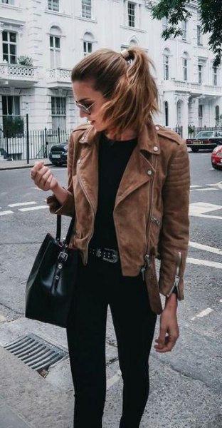 brown jacket with black handbag and matching jeans